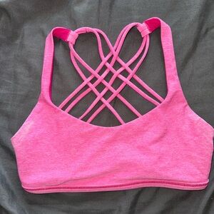 Pink Lululemon sports bra